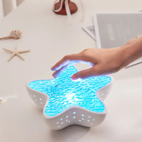 Proyector LED de estrella de mar y galaxia